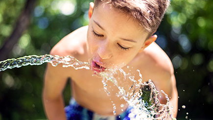 LSL-About-Lead-Boy-Drinking-Water-Hose